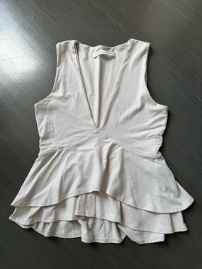 Susana Monaco Sleeveless Deep V Peplum Top in Light Beige